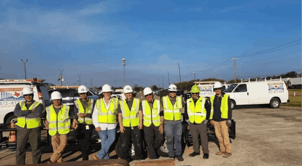 Corridor Services team in safety vests and hard hats